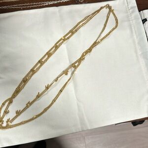 Gold tone necklaces.